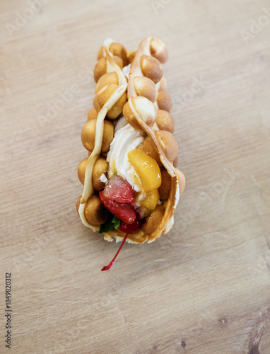 Tasty bubble waffle with cream
