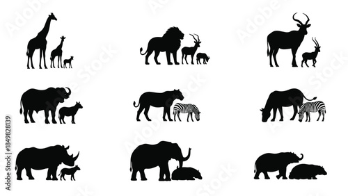 Collection of silhouetted animals with their young in a natural setting viewed from the side