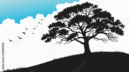 silhouette of majestic spreading tree on hillside with flying birds against bright blue sky and white clouds