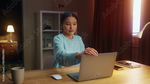 Asian woman worker remote work home. Girl take break finished went rest. Tired female employee end task close laptop. Ceo person use pc. Online education. Computer freelance. Distant internet job.