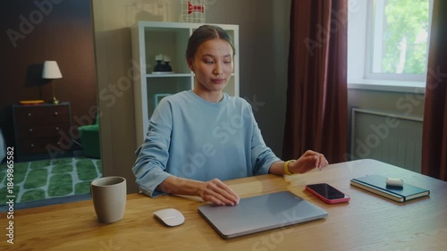 Asian woman worker remote work home. Girl take break finished went rest. Tired female employee end task close laptop. Ceo person use pc. Online education. Computer freelance. Distant internet job.