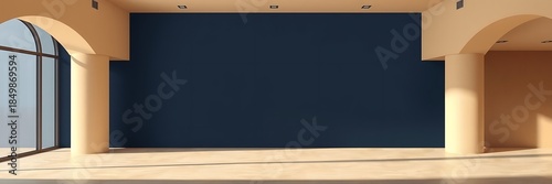 Spacious interior with large arched windows, cream columns, and a deep navy blue accent wall, illuminated by natural light.