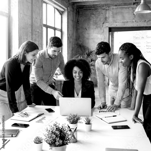 Team collaborates in office meeting to discuss project updates