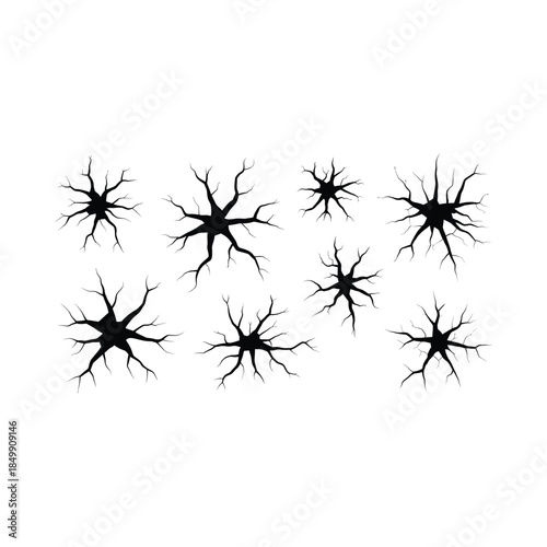 A collection of black cracks resembling spiderwebs on a white background