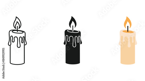 Three burning candles in different colors