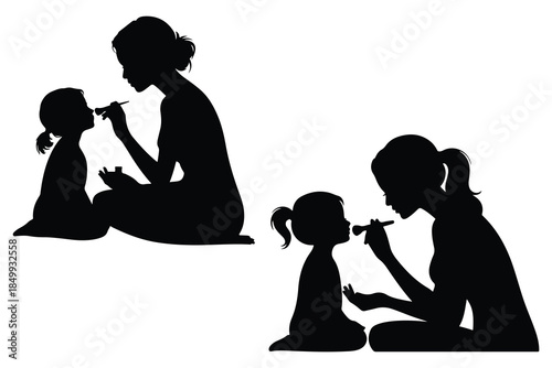 Silhouettes of Women Painting Faces of Children