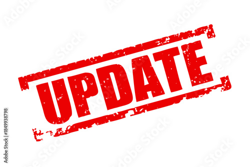 Grungy red rectangular rubber stamp displaying the important word update on a dark black background