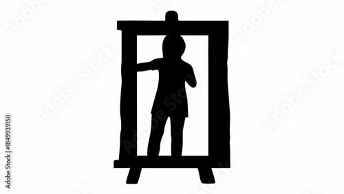 Silhouette of woman painting on large canvas standing on easel