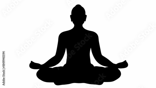 Serene silhouette of a person meditating in lotus position