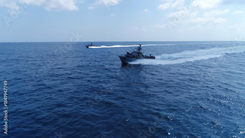 Israeli Navy Missile Boats High Speed

Aerial view of Israeli Navy Saar class missile boats sailing at high speed across open sea, Israel, November 2025.
