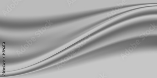 Silver foil background with a metallic mirror texture. Chrome gradient surface with a slight sheen. Gray aluminum sheet with reflections. Abstract cool background of platinum and titanium.