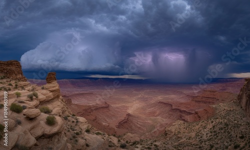 Dramatic storm over a vast canyon