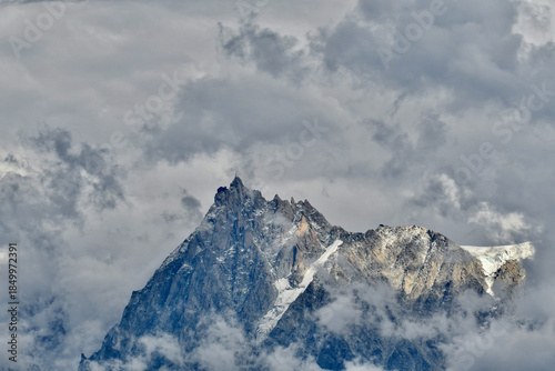 Ouest side of the Aiguille du Midi ,Southern Needle, is a 3,842-metre-tall (12,605 ft) mountain in the Mont Blanc massif within the French Alps.