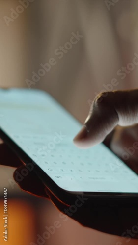 Person Using WhatsApp on Smartphone – Online Chatting Concept Vertical