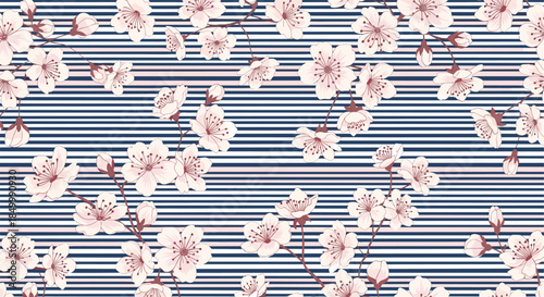 Seamless pattern of pink cherry blossoms on a stylish navy blue and white striped background for a modern floral design.