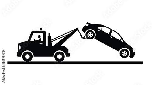 Tow truck lifting a car off the ground in a rescue operation