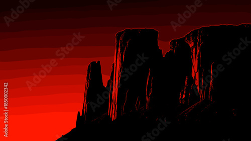Silhouetted Rock Formation Against Red Sky.
