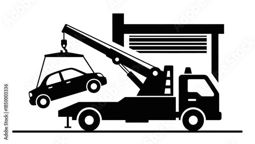 Towing truck lifting a car with a crane arm.