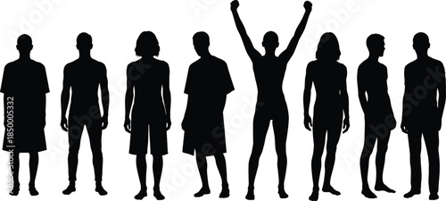 A group of people in silhouette with one celebrating