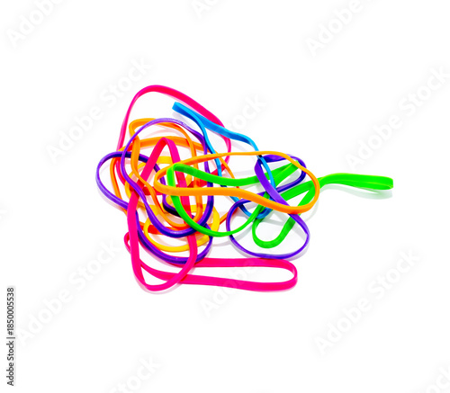Colorful rubber bands creating a tangled mess on white