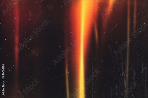 light leak overlay effect with scratch dust and motion blur orange light leaks,retro noisy film texture light leak flare on black background,abstract background with ray,grunge film strip background