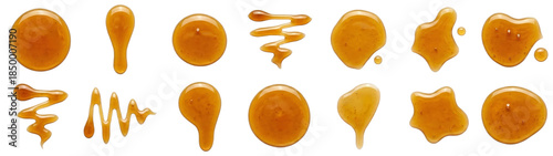 creative composition of scattered honey drops and drizzles isolated on transparent background