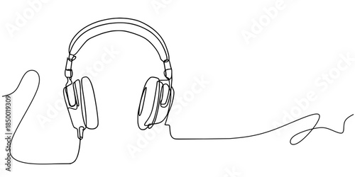 Modern black studio headphones with a professional cable and microphone are isolated on a white background for high-quality audio and music technology equipment needs
