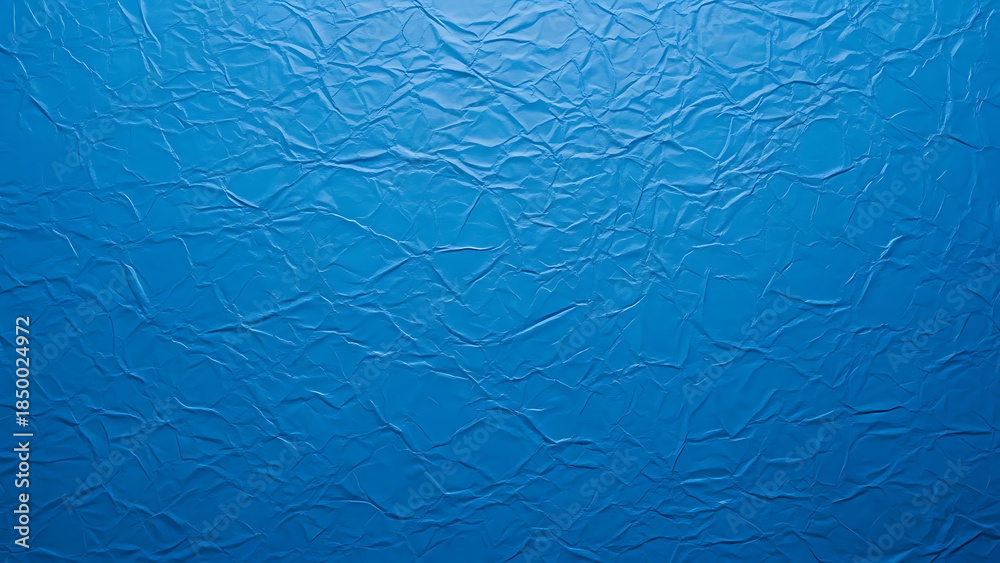 Fototapeta premium Blue crinkled paper texture background