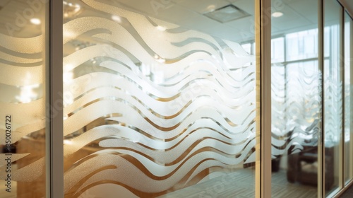 Modern office glass partition with wavy frosted design for privacy and aesthetic interior decor