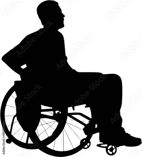 A person using a wheelchair looks forward with determination.