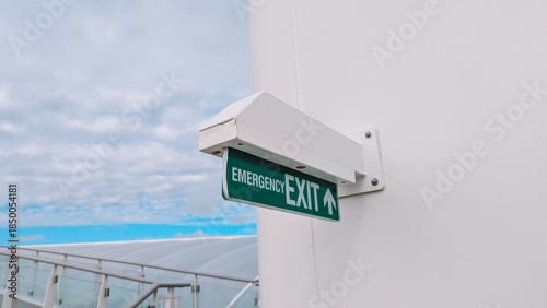 Close Up View Illuminated Green Exit Sign 