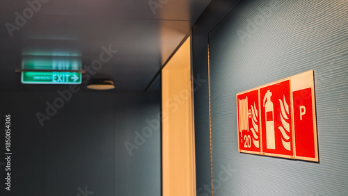Close Up View Illuminated Green Exit Sign 