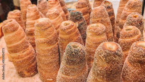Traditional Chimney Cakes (Trdelnk) Roasting Over an Open Flame