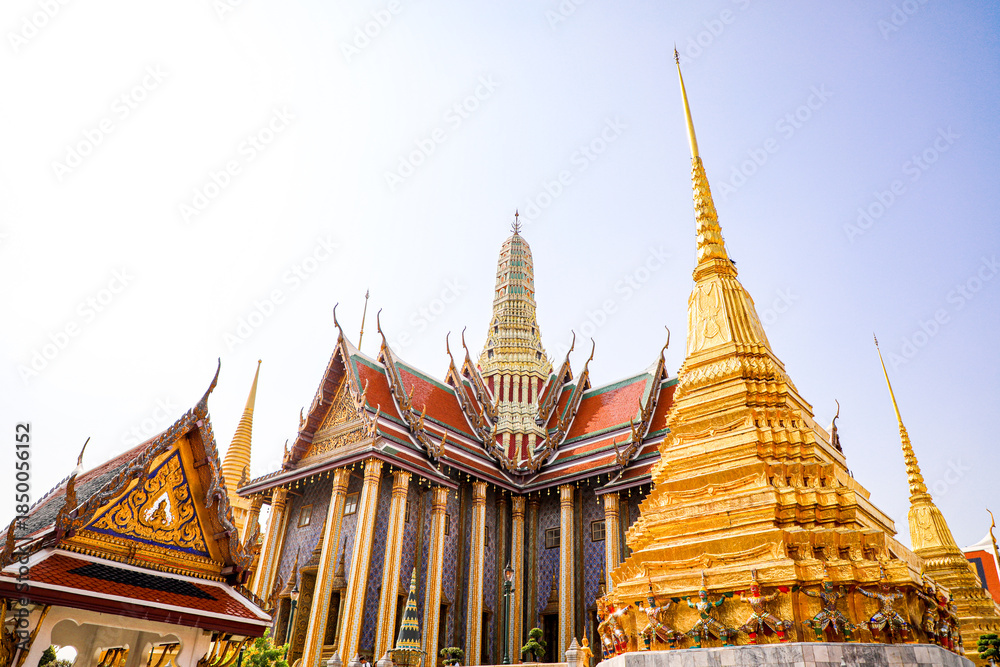 Fototapeta premium Wat Phra Kaew or Wat Phra Sri Rattana Satsadaram is temple used for various royal ceremonies during reign of King Rama I. It is temple within the Grand Palace. Inside temple is the Emerald Buddha.