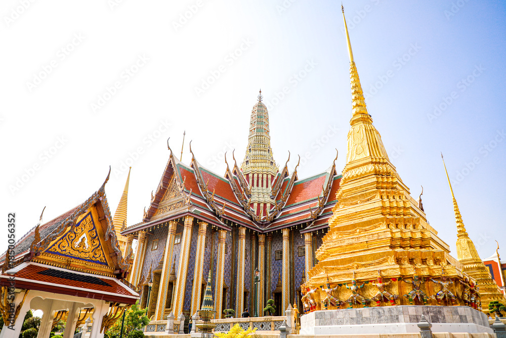 Fototapeta premium Wat Phra Kaew or Wat Phra Sri Rattana Satsadaram is temple used for various royal ceremonies during reign of King Rama I. It is temple within the Grand Palace. Inside temple is the Emerald Buddha.