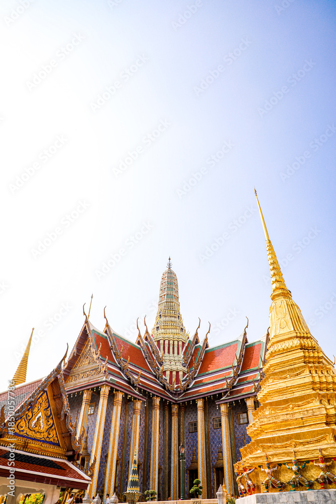 Fototapeta premium Wat Phra Kaew or Wat Phra Sri Rattana Satsadaram is temple used for various royal ceremonies during reign of King Rama I. It is temple within the Grand Palace. Inside temple is the Emerald Buddha.
