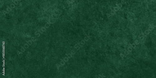 Abstract Elegant dark green background with mottled vintage texture in old fancy background design, texture of colored parchment paper.	