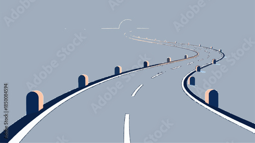 Empty winding road stretching into the distance under a muted sky