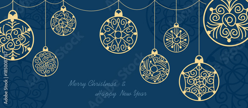 Christmas greeting card with a row of hanging decorative lace ornaments a deep blue background 