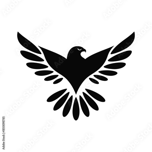 Black silhouette of an eagle or hawk in flight isolated on