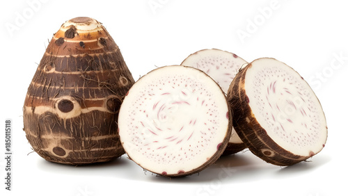 Whole and sliced taro root isolated