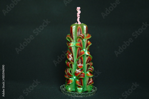 Canvas-taulu Handcrafted carved candle made from layered green and red wax design