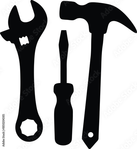 Essential hand tools collection featuring an adjustable wrench, a screwdriver, and a classic claw hammer