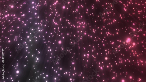Soft glowing pink particles floating in motion across a dark atmospheric background