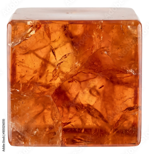 Smooth orange halite cube featuring visible internal fractures.