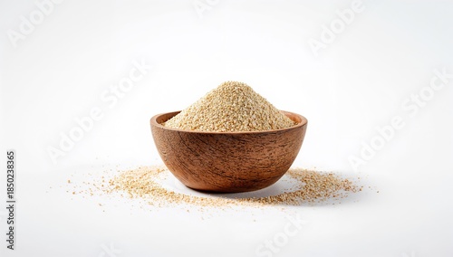 Fototapeta Naklejka Na Ścianę i Meble -  White pepper powder in a wooden bowl prepared for cooking, emphasizing natural spice processing, World Food Day