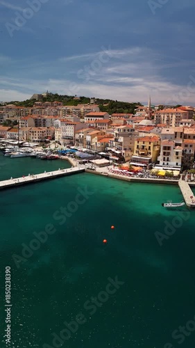 Aerial View of Calvi Waterfront Marina and Colorful Cafes in Corsica France