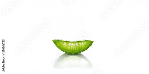 Aloe vera leaf on plain bac...