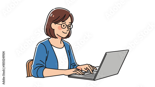 Woman with glasses typing on a laptop at a desk
