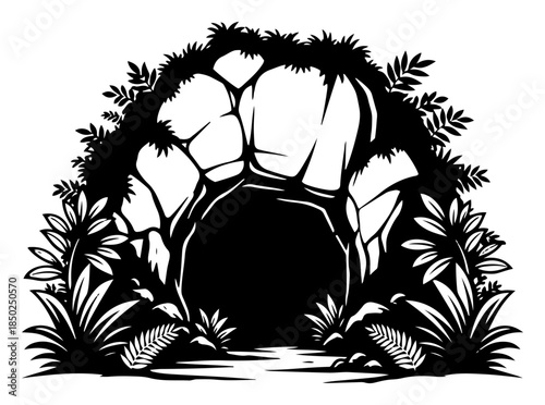 Stone cave entrance surrounded by tropical plants and ferns